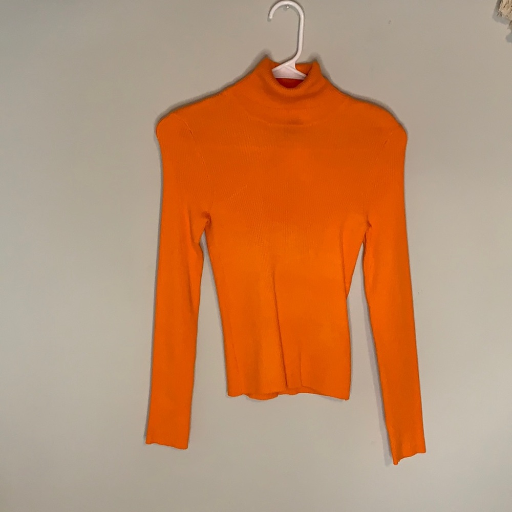 Divided neon orange turtle neck